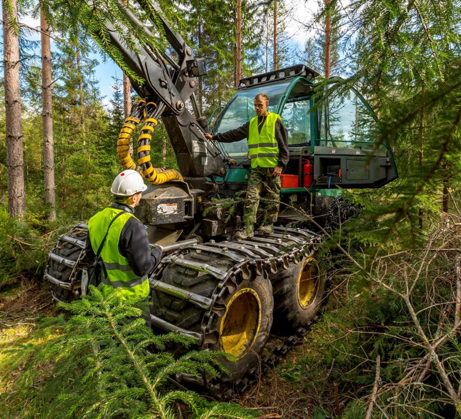 Komatsu forestry men in the field